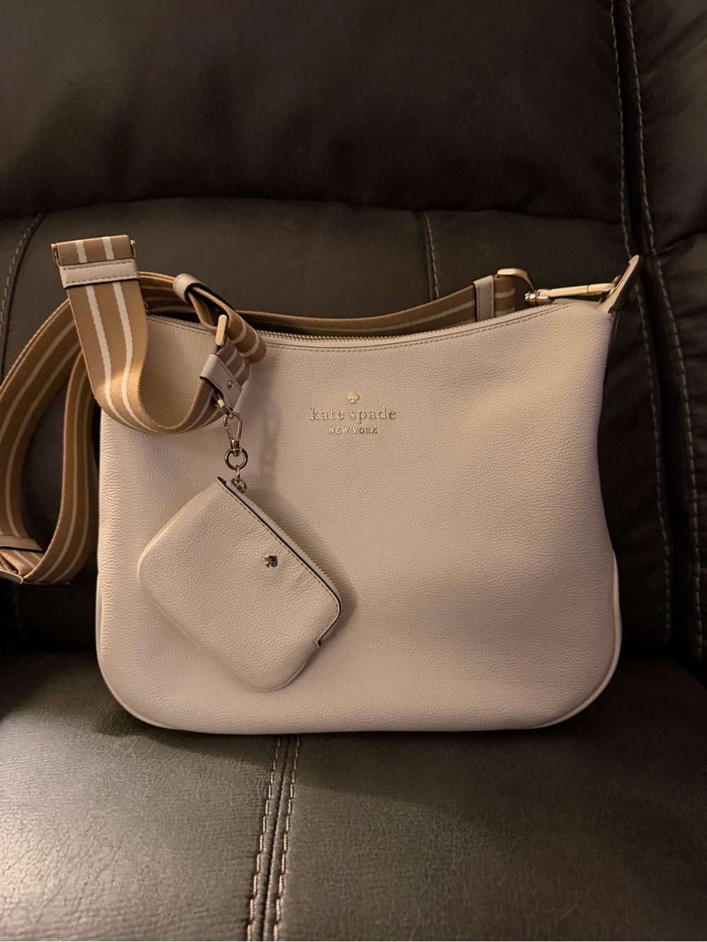 kate spade Pebbled Leather Crossbody in Light Cream with Tan Strap